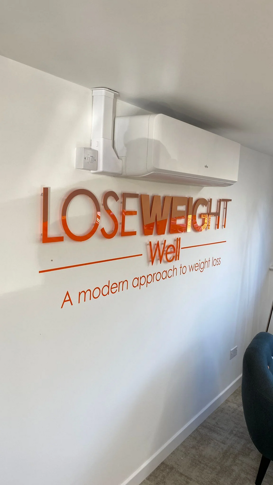 In store signage for an organisation called Loseweight Well