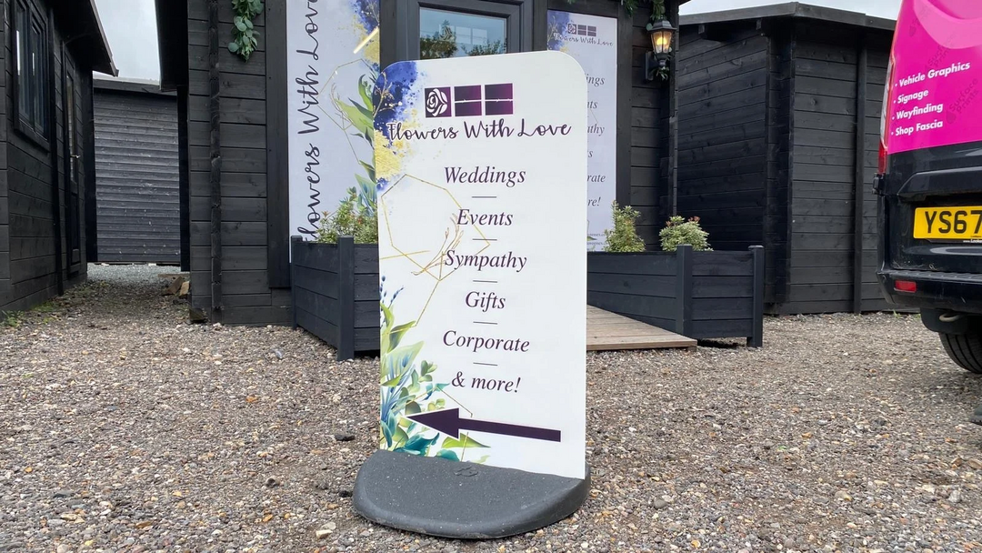 An outdoor board for a weddings company.
